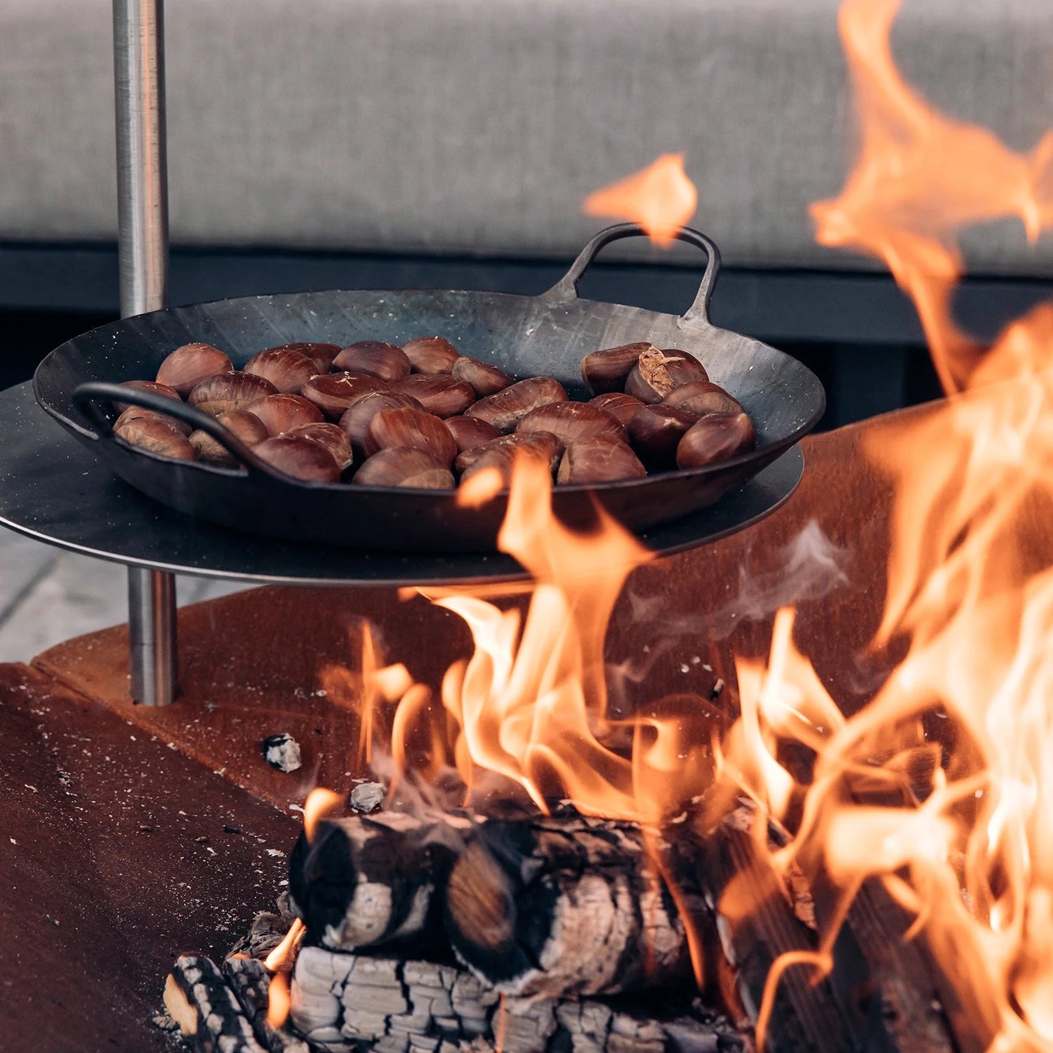 Höfats TRIPLE Table for grilling and cooking on TRIPLE fire pits.
